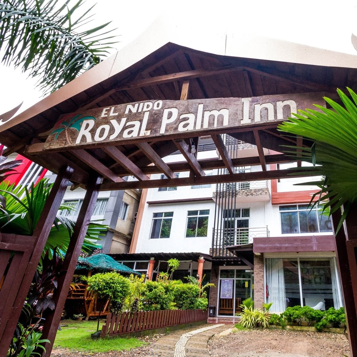 Royal Palm Inn nestled among palm trees